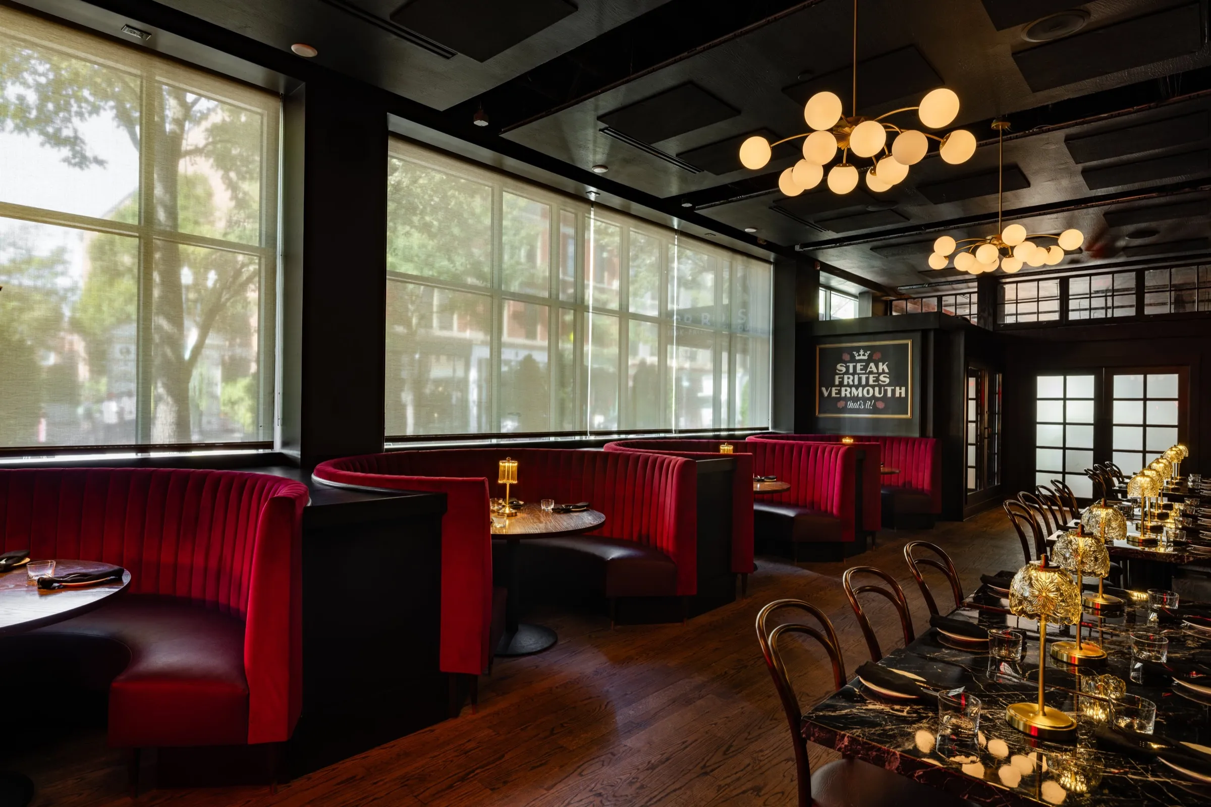 Red velvet booths along the Vine Street windows in the private dining room
